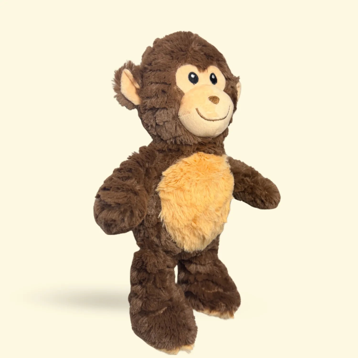 Large Plush monkey dog toy on a beige background