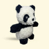 Hairy Barry Plush panda dog toy on a beige background