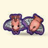 Hairy Barry flying dog toy with Two cartoon-style when pigs fly pigs with wings on a beige background